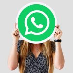 woman-showing-whatsapp-messenger-icon2